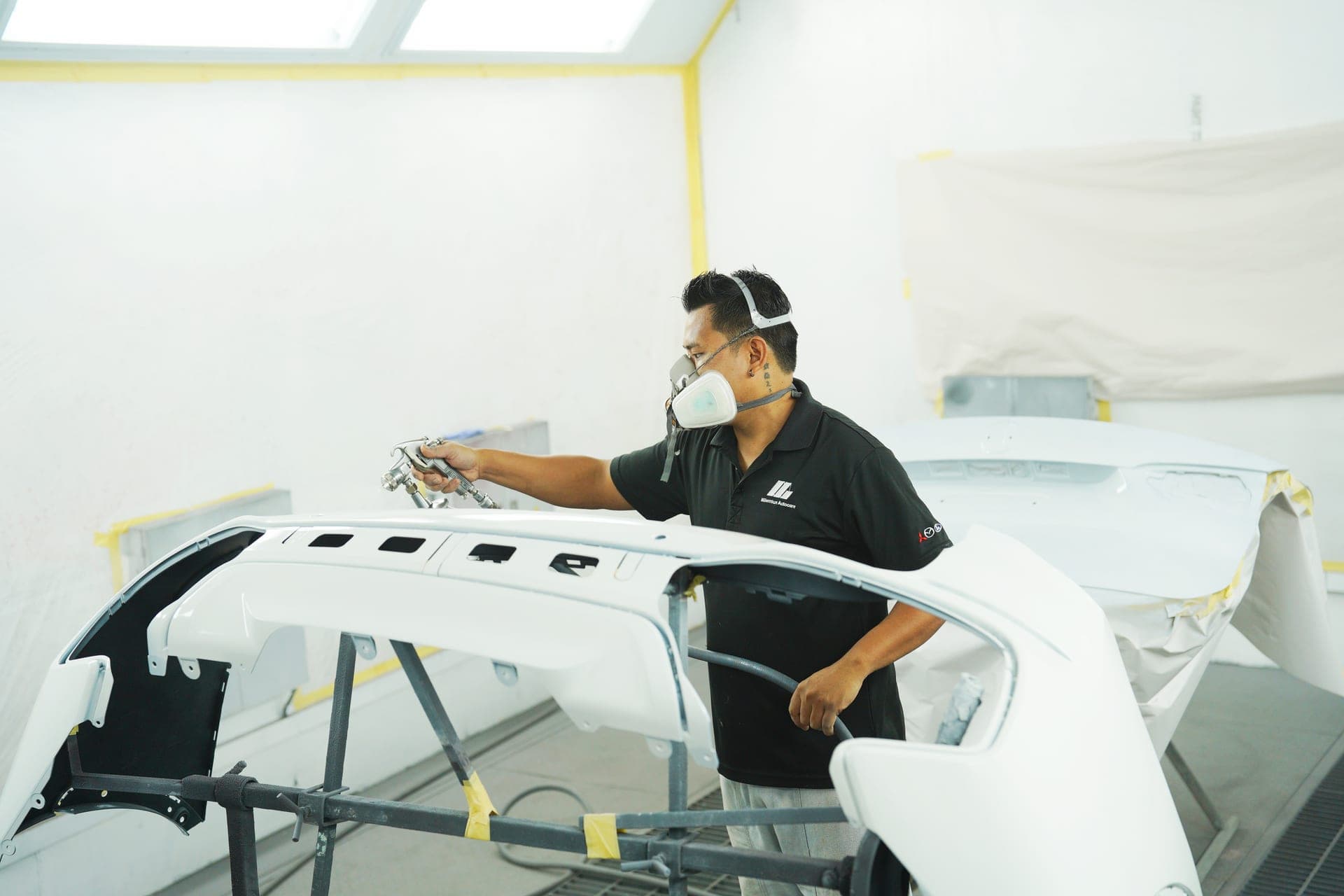 Certified painter in water-base spray booth